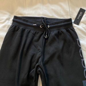 NWT bebe Sport Black Jogger Sweatpants with Iridescent Logo Size Med